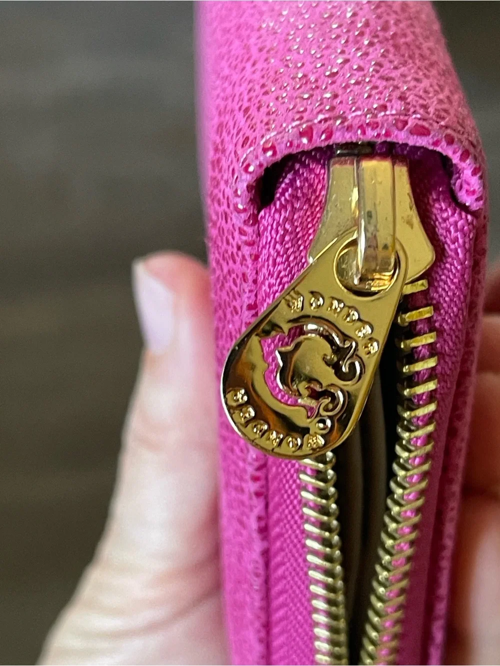 C. Wonder Fuchsia Zip-Around Wallet with Gold Logo